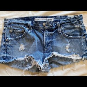 Lovers& Friends Low rise Denim distressed Shorts